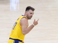 九游娱乐登录-独行侠击败热火，东契奇砍下高分